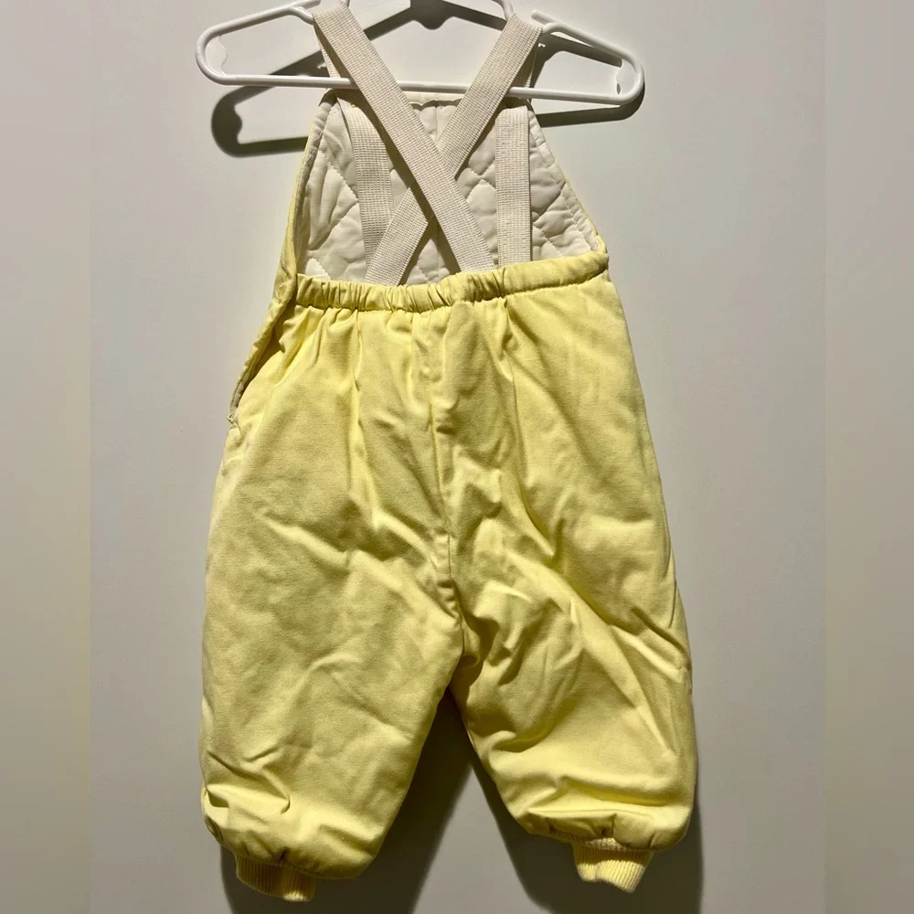 Vintage yellow two-piece baby snowsuit by Playland featuring embroidered giraffe